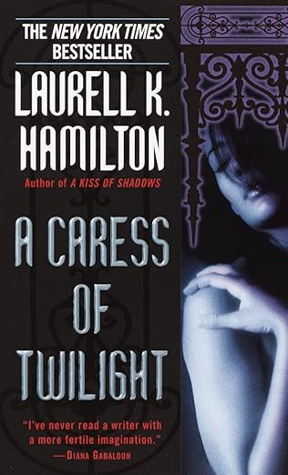 A Caress of Twilight- Laurell K. Hamilton